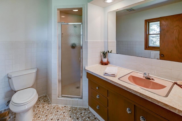 7628 W Mineral Point Rd, Verona, WI 53593 - full bathroom with tile walls, tile patterned flooring, a stall shower, toilet, and vanity