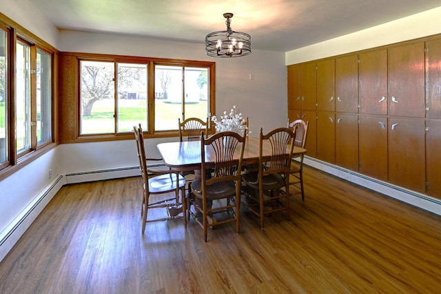 7628 W Mineral Point Rd, Verona, WI 53593 - dining room with a chandelier, plenty of natural light, dark wood-style flooring, and a baseboard heating unit