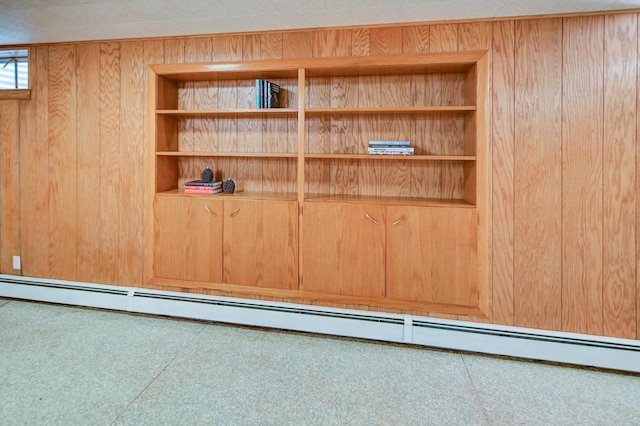7628 W Mineral Point Rd, Verona, WI 53593 - detailed view of baseboard heating, wood walls, and built in features