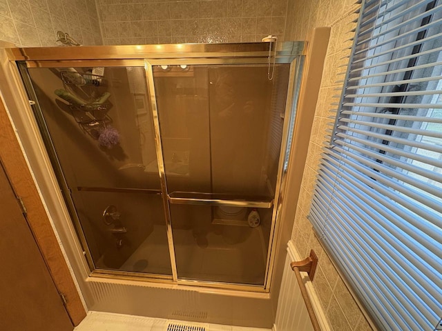 W5946 Beach Dr, New Lisbon, WI 53950 - full bath featuring combined bath / shower with glass door