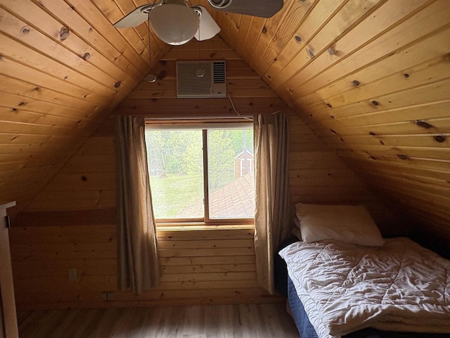 W5946 Beach Dr, New Lisbon, WI 53950 - unfurnished bedroom with vaulted ceiling, wood walls, wood ceiling, and wood finished floors