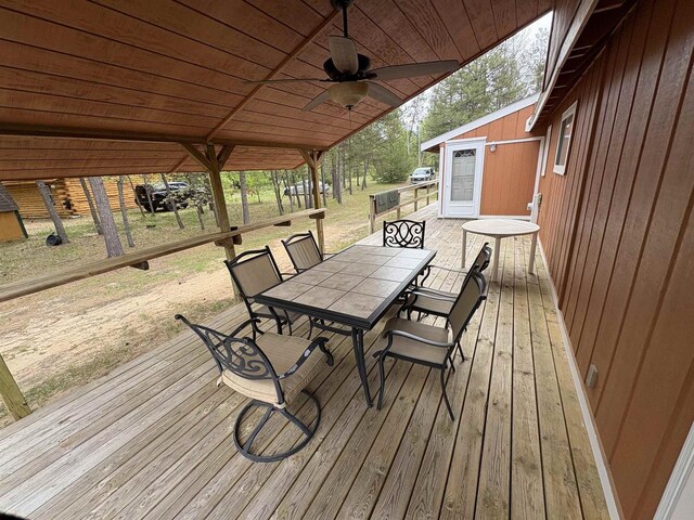 W5946 Beach Dr, New Lisbon, WI 53950 - wooden terrace featuring outdoor dining space and ceiling fan