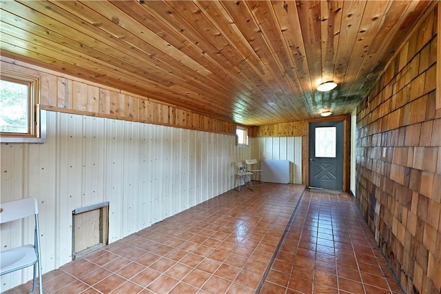 12642 Paddock Rd, Hayward, WI 54843 - tiled spare room with wooden walls