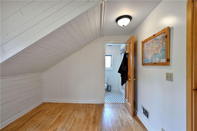 12642 Paddock Rd, Hayward, WI 54843 - additional living space with lofted ceiling and light wood-type flooring