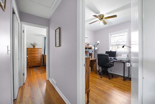 N2356 County Road D Ft, Atkinson, WI 53538 - home office with light wood-style flooring, ceiling fan, and baseboards