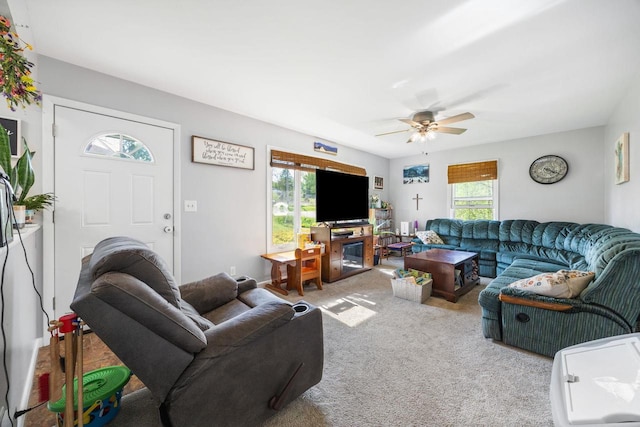 N2356 County Road D Ft, Atkinson, WI 53538 - carpeted living area with plenty of natural light and a ceiling fan