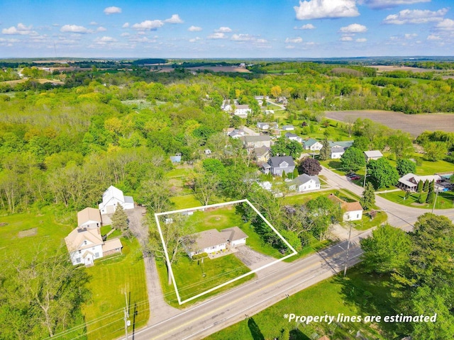 N2356 County Road D Ft, Atkinson, WI 53538 - aerial perspective of suburban area with property parcel outlined and a heavily wooded area