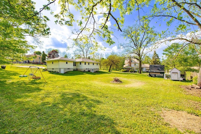 N2356 County Road D Ft, Atkinson, WI 53538 - view of grassy yard with a storage unit and an outdoor structure
