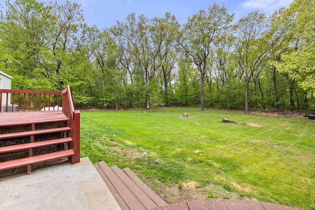 7244 Pine Tree Dr, Almond, WI 54909 - view of green lawn featuring a wooden deck