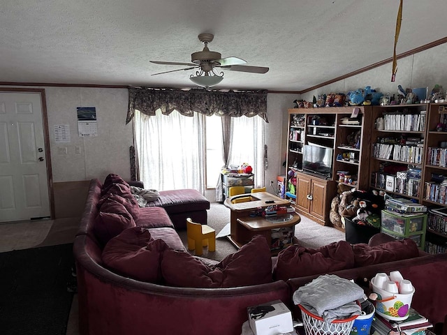 7962 N State Highway 45, Eland, WI 54427 - carpeted living room with a textured ceiling, ceiling fan, and ornamental molding