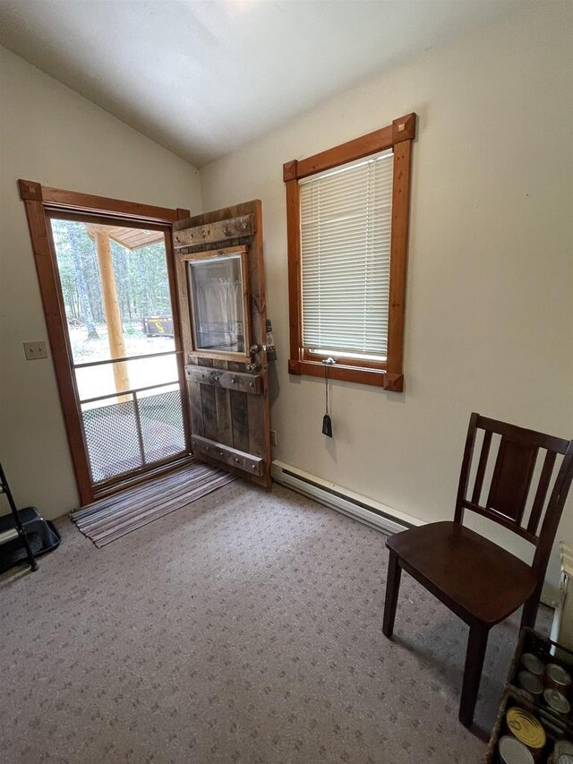 N18355 Big Bear Rd, Pembine, WI 54156 - unfurnished room with a baseboard radiator, carpet floors, and lofted ceiling