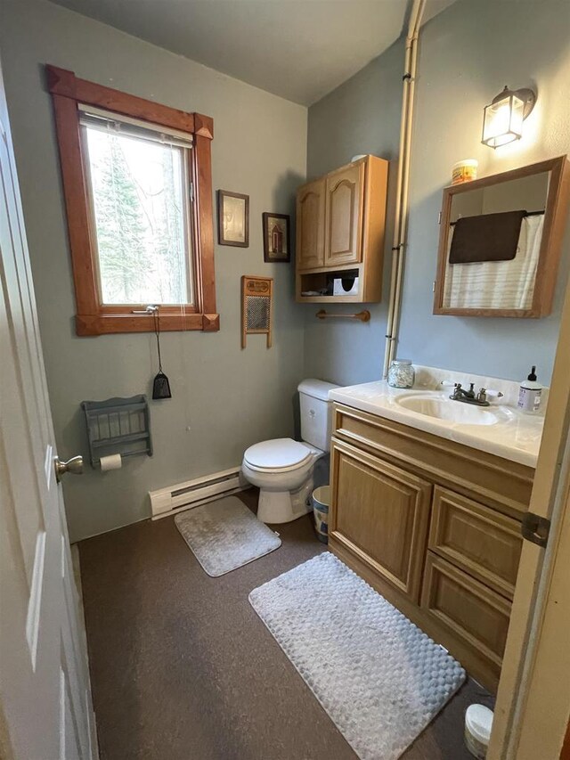 N18355 Big Bear Rd, Pembine, WI 54156 - bathroom with a baseboard heating unit, toilet, and vanity