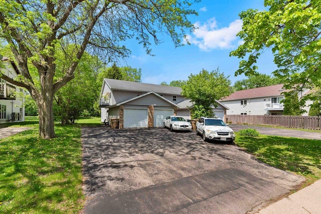 18 Northridge Ter, Madison, WI 53704 - view of front of home with driveway and a garage