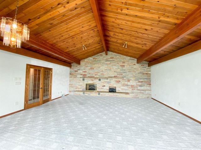 831 County Road Ig, Livingston, WI 53554 - unfurnished living room with baseboards, carpet, a chandelier, wooden ceiling, and a stone fireplace