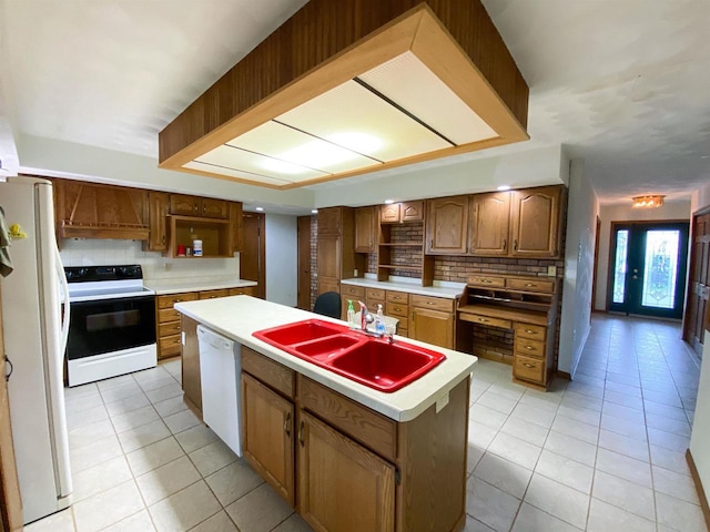 831 County Road Ig, Livingston, WI 53554 - kitchen with white appliances, a sink, light tile patterned floors, and a center island