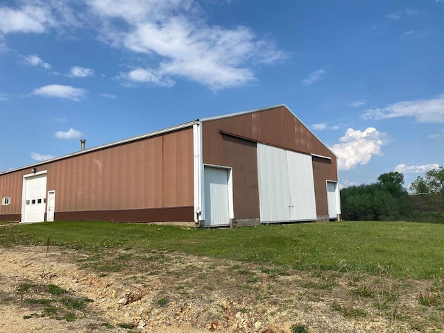831 County Road Ig, Livingston, WI 53554 - view of pole building featuring a lawn