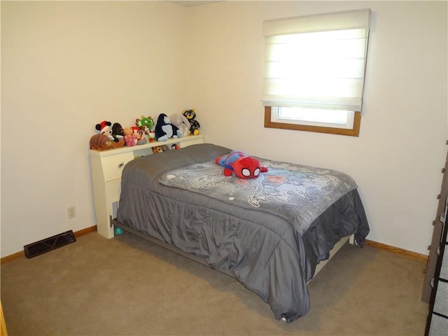 3412 Jill Ave, Eau Claire, WI 54701 - carpeted bedroom featuring baseboards