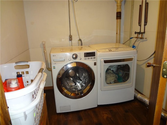 3412 Jill Ave, Eau Claire, WI 54701 - washroom with washer and dryer and wood finished floors