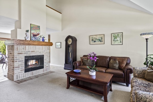 1293 Chesterwood Ln, Pewaukee, WI 53072 - carpeted living room with a towering ceiling, a brick fireplace, and baseboards