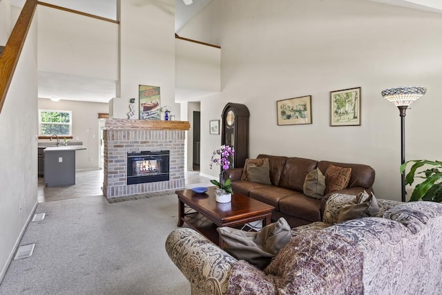 1293 Chesterwood Ln, Pewaukee, WI 53072 - living room with carpet, baseboards, a towering ceiling, and a brick fireplace