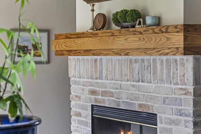 1293 Chesterwood Ln, Pewaukee, WI 53072 - detailed view of a brick fireplace