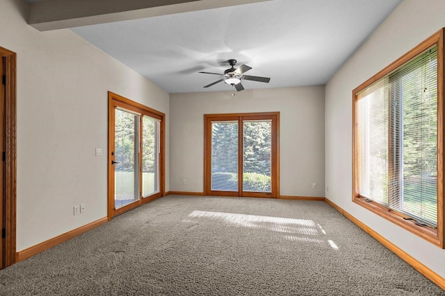 N8454 Muirfield Way, Menasha, WI 54952 - carpeted spare room featuring baseboards and ceiling fan