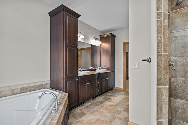 N8454 Muirfield Way, Menasha, WI 54952 - bathroom featuring a bath, double vanity, and tiled shower
