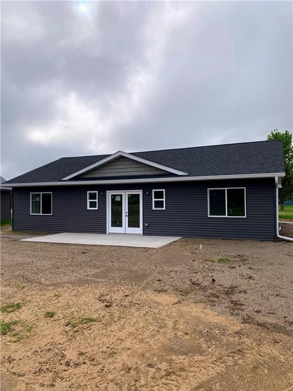 202 Huset Ln, Dallas, WI 54733 - rear view of house with a patio area, roof with shingles, and french doors