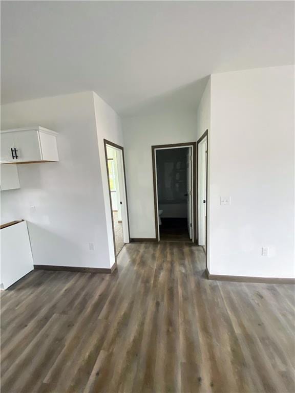 202 Huset Ln, Dallas, WI 54733 - empty room featuring baseboards and dark wood finished floors