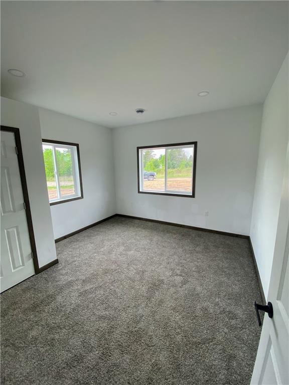 202 Huset Ln, Dallas, WI 54733 - unfurnished room featuring carpet flooring and baseboards