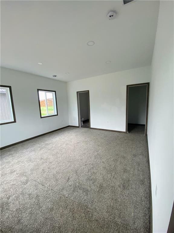 202 Huset Ln, Dallas, WI 54733 - carpeted empty room featuring baseboards and a smoke detector