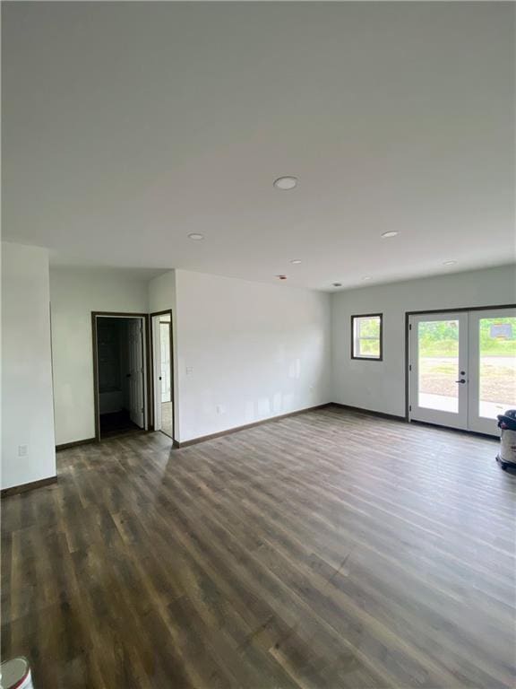 202 Huset Ln, Dallas, WI 54733 - spare room featuring french doors, dark wood-style floors, baseboards, and recessed lighting
