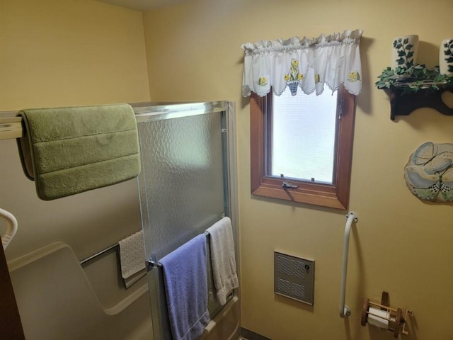 4055W Lester Ln, Loretta, WI 54896 - full bathroom featuring a shower with door and heating unit
