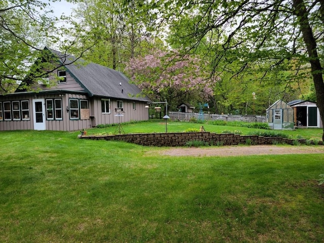 4055W Lester Ln, Loretta, WI 54896 - view of yard featuring an outbuilding and a storage shed