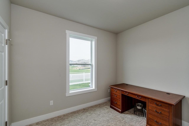 241 E Hubert St, Edgerton, WI 53534 - unfurnished office featuring baseboards and light colored carpet