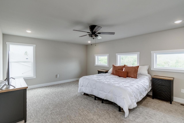 241 E Hubert St, Edgerton, WI 53534 - bedroom featuring multiple windows, recessed lighting, light colored carpet, baseboards, and ceiling fan