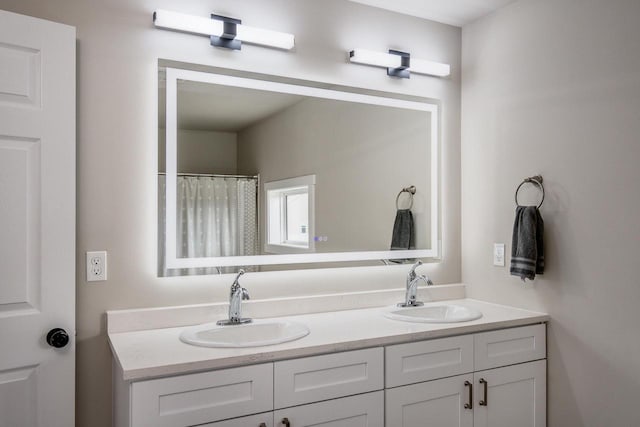 241 E Hubert St, Edgerton, WI 53534 - bathroom featuring double vanity