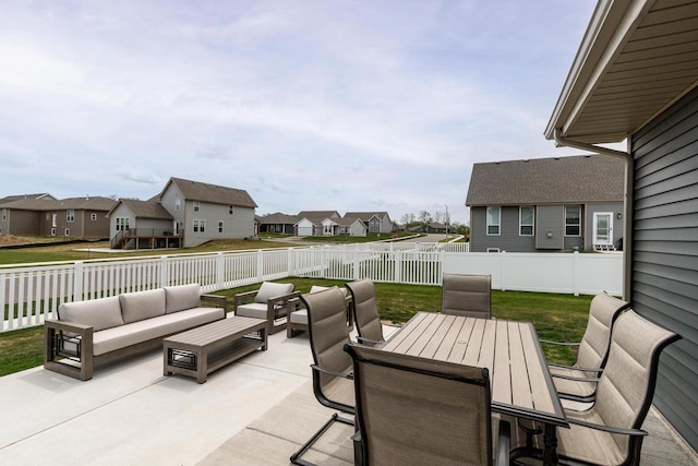 241 E Hubert St, Edgerton, WI 53534 - view of patio / terrace featuring an outdoor living space, a residential view, and outdoor dining area
