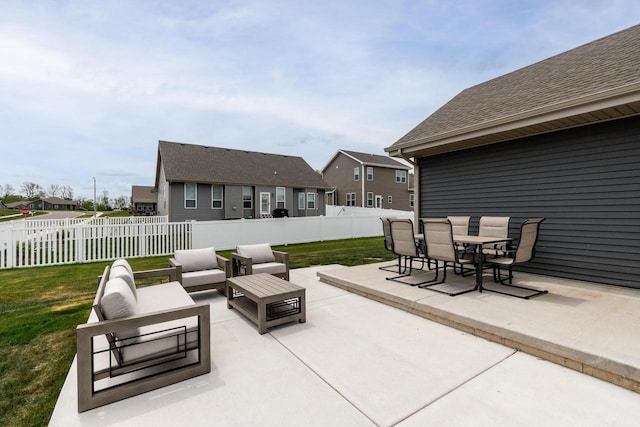241 E Hubert St, Edgerton, WI 53534 - view of patio featuring an outdoor hangout area, a residential view, and outdoor dining space