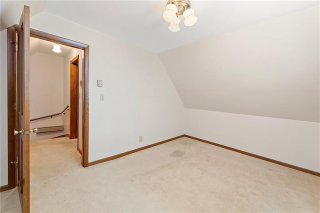 N7681 Jagielo Rd, Pittsville, WI 54466 - bonus room with light carpet, lofted ceiling, baseboards, and a chandelier
