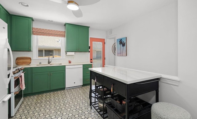 4106 Meyer Ave, Madison, WI 53711 - kitchen featuring a sink, white appliances, green cabinetry, and light countertops