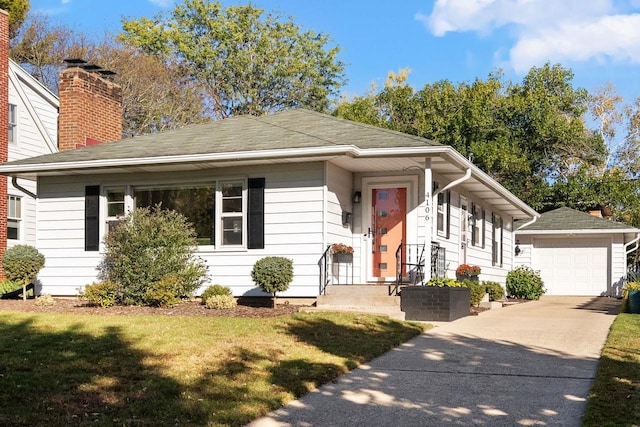 4106 Meyer Ave, Madison, WI 53711 - ranch-style home featuring an outdoor structure, driveway, a detached garage, a front lawn, and roof with shingles
