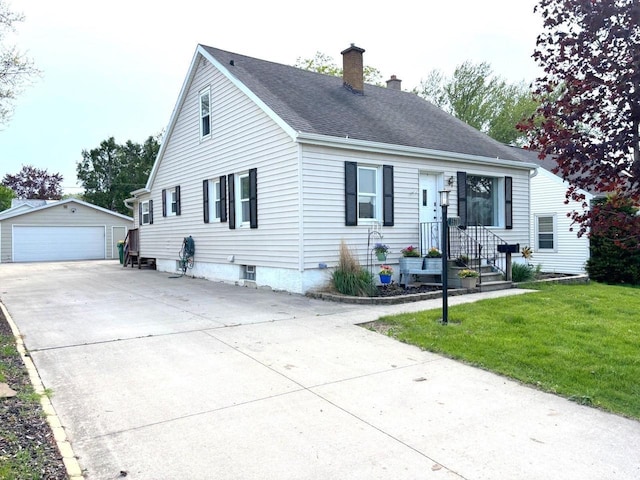 1578 Cass St, Green Bay, WI 54302 - view of front of home featuring a chimney, an outdoor structure, a detached garage, a front yard, and roof with shingles