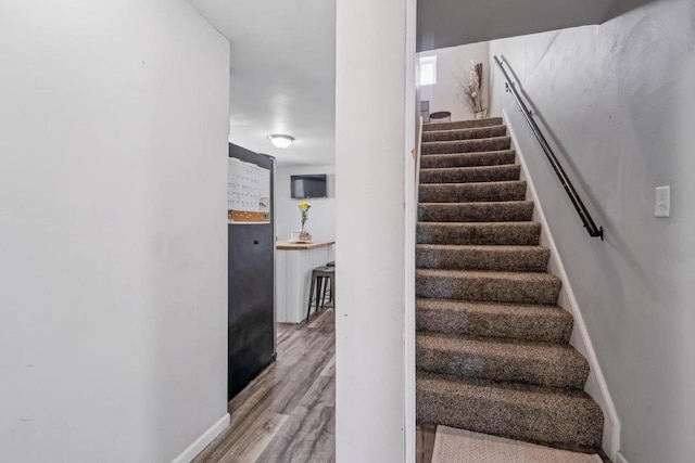 1578 Cass St, Green Bay, WI 54302 - stairs featuring wood finished floors and baseboards
