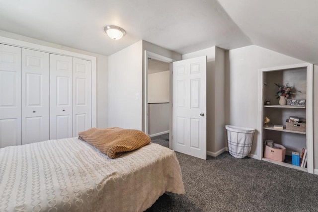 1578 Cass St, Green Bay, WI 54302 - carpeted bedroom featuring vaulted ceiling, a closet, and baseboards