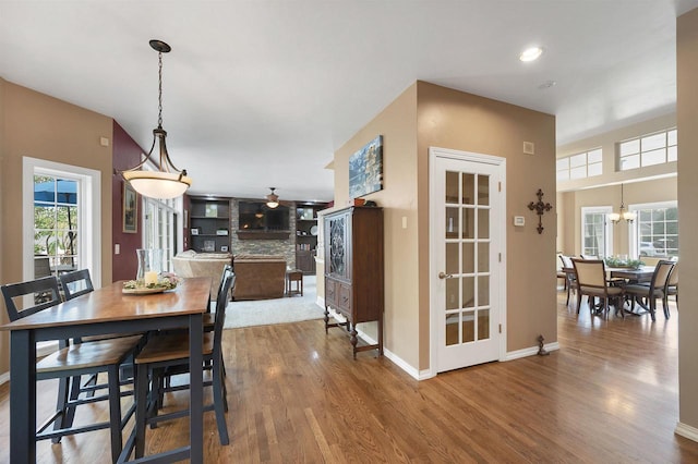 1516 Bradbury Ct, Green Bay, WI 54313 - dining area with wood finished floors, ceiling fan, baseboards, and recessed lighting