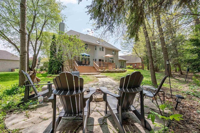 1516 Bradbury Ct, Green Bay, WI 54313 - view of patio / terrace featuring a wooden deck and a fire pit