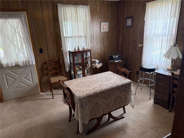 23923 Washington St, Independence, WI 54747 - dining area with light carpet and wooden walls