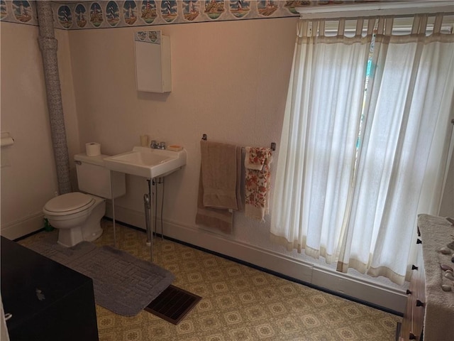 23923 Washington St, Independence, WI 54747 - bathroom with baseboards and toilet