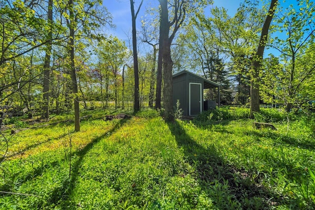 4619 Stonebridge Dr, Racine, WI 53404 - view of yard featuring an outbuilding